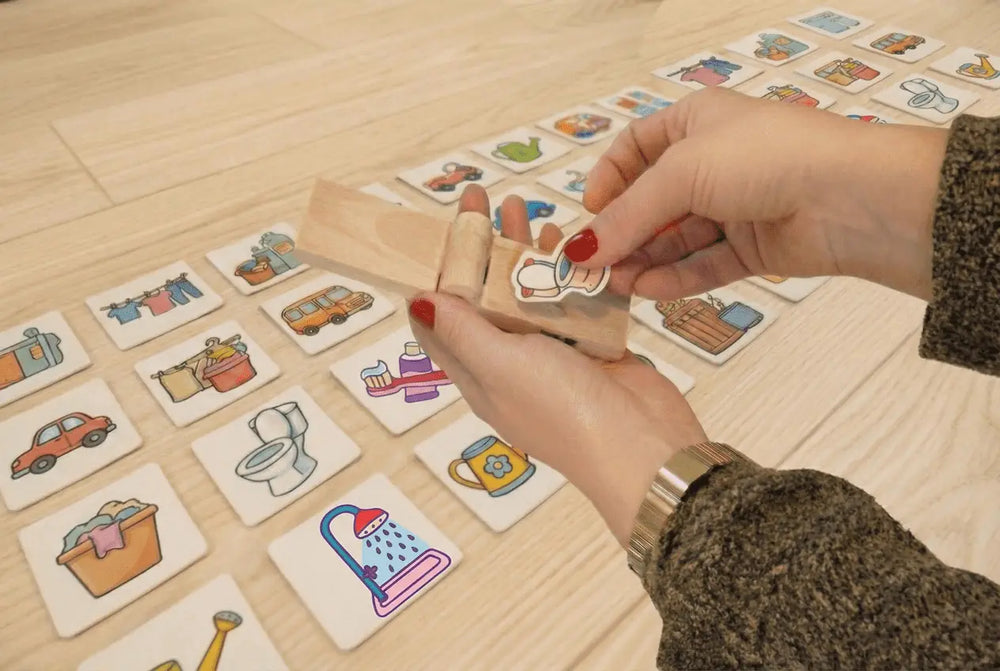 A child flipping a wooden routine tile on Flipzy